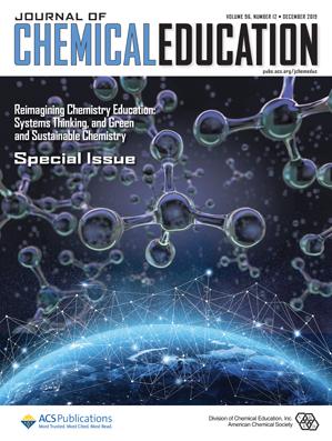 journal of chemical education special issue with molecules floating in space above a quarter of the Earth with a network map above it