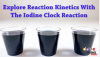 Three glass cups with Iodine clock reaction on white background.