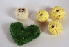 Green heart, 3 yellow beads and one smiley face bead.